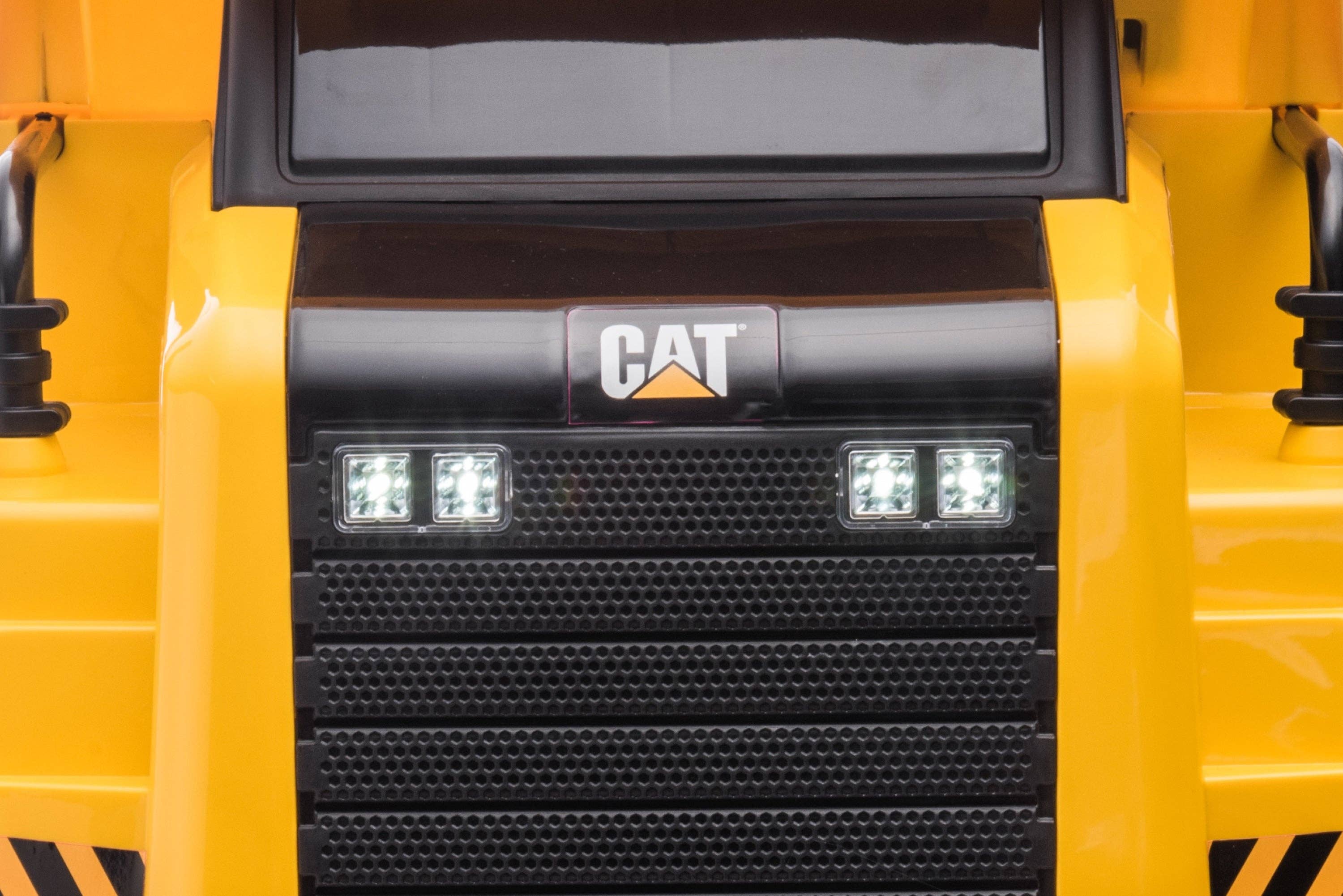 Yellow 12V CAT Electric Dump Truck 1 Seater Ride-on for wholesale on Faire9