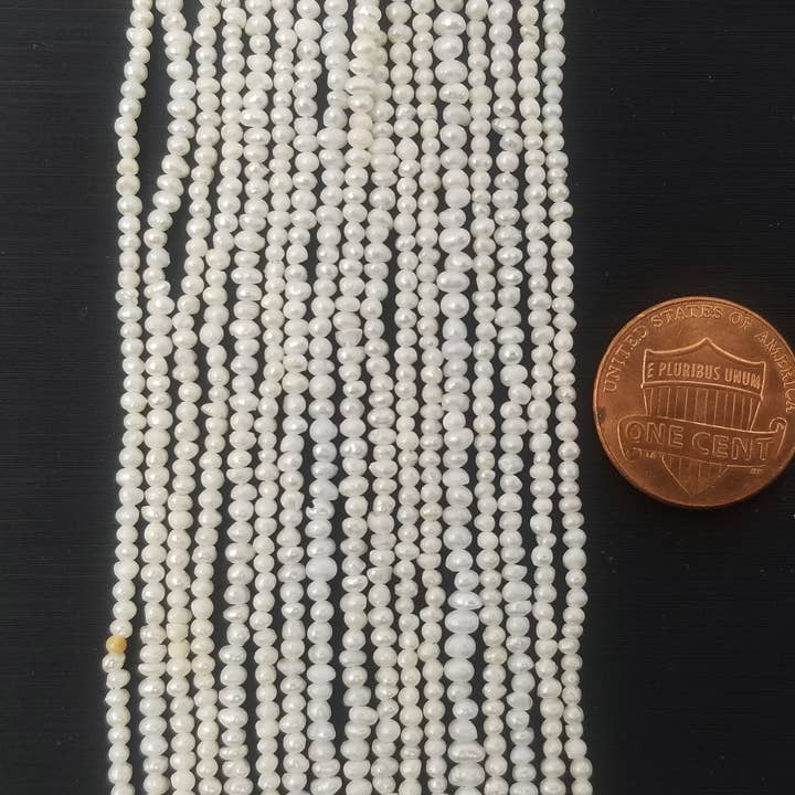 Beads Creation – wholesale Beads – Fresh Water Pearl Center Drill White Nugget Beads PRP3661