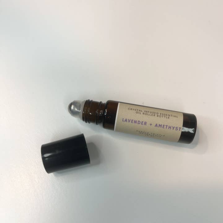 Lavender + Amethyst Crystal Infused EO Roller Bottle for wholesale by Purple Thistle Botanicals