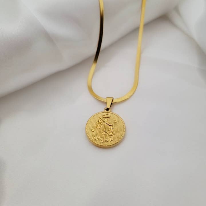 Libra Zodiac Coin Necklace for wholesale by The Casson Collection