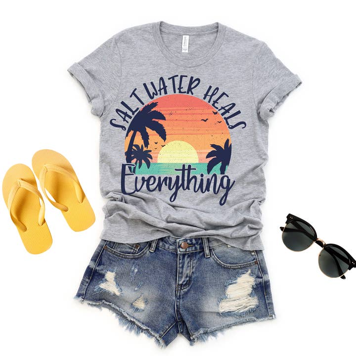 Saltwater Heals Everything | Beach | Summer | Graphic Tee for wholesale by The American Honey