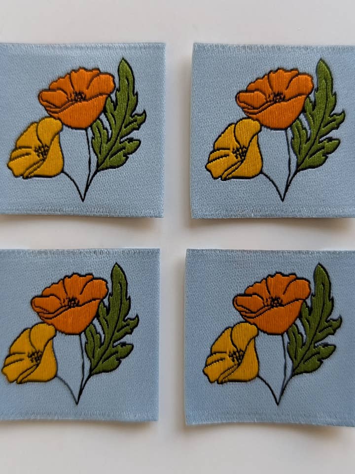 August Poppies | Woven Luxe Labels for wholesale by Intensely Distracted