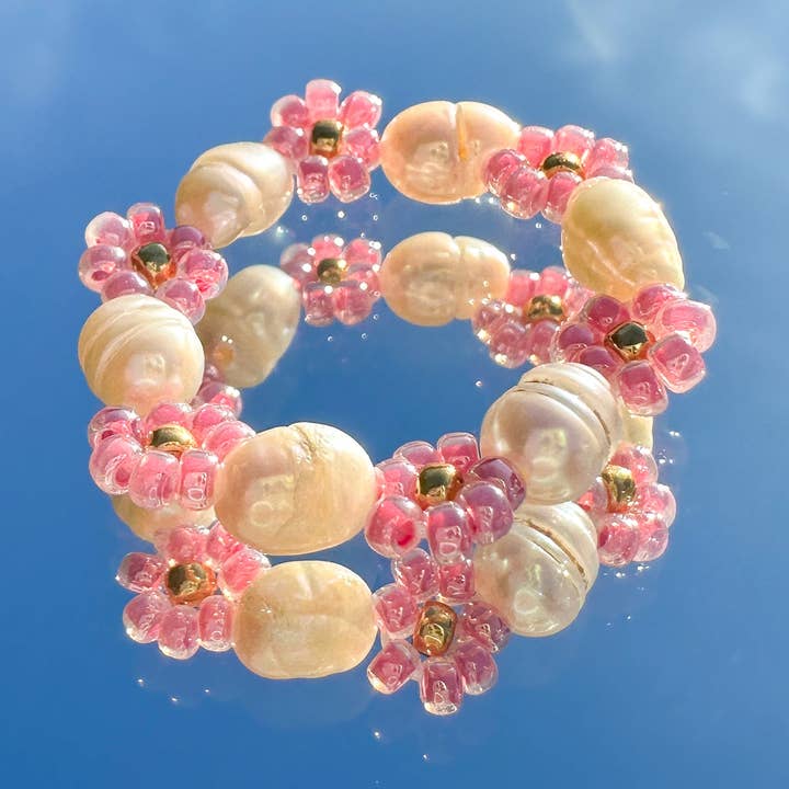 Blomring "Flora" av glaspärlor och sötvattenspärlor i rosa för wholesale av cool people club