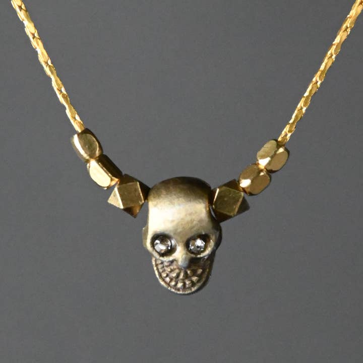Mini Gold Hematite Skull w/ Crystal Eyes Necklace for wholesale by KBD Studio