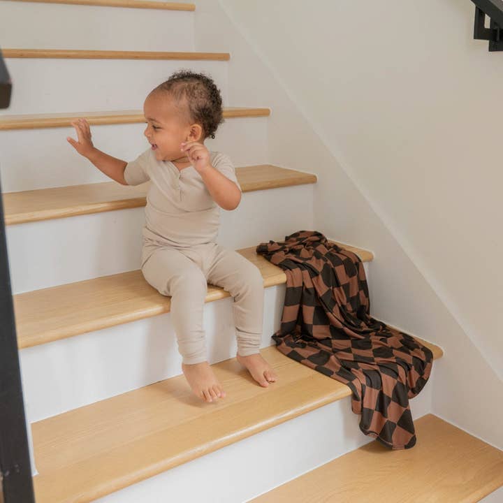 Ellie Sue - Wholesale Swaddle - Baby - Ink & Earth Checkerboard Stretch Swaddle Blanket1