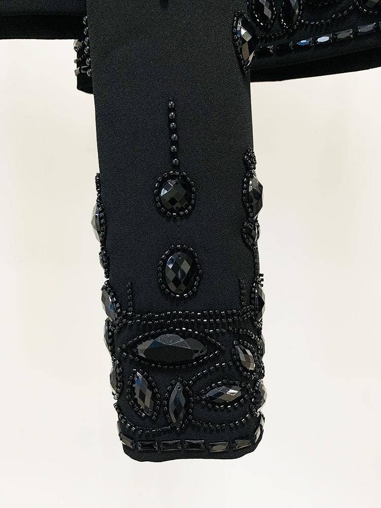 Preto Conjunto de duas peças Emery com blusa de manga longa e saia, decorado com cristais pretos para venda a revendedores na Faire5