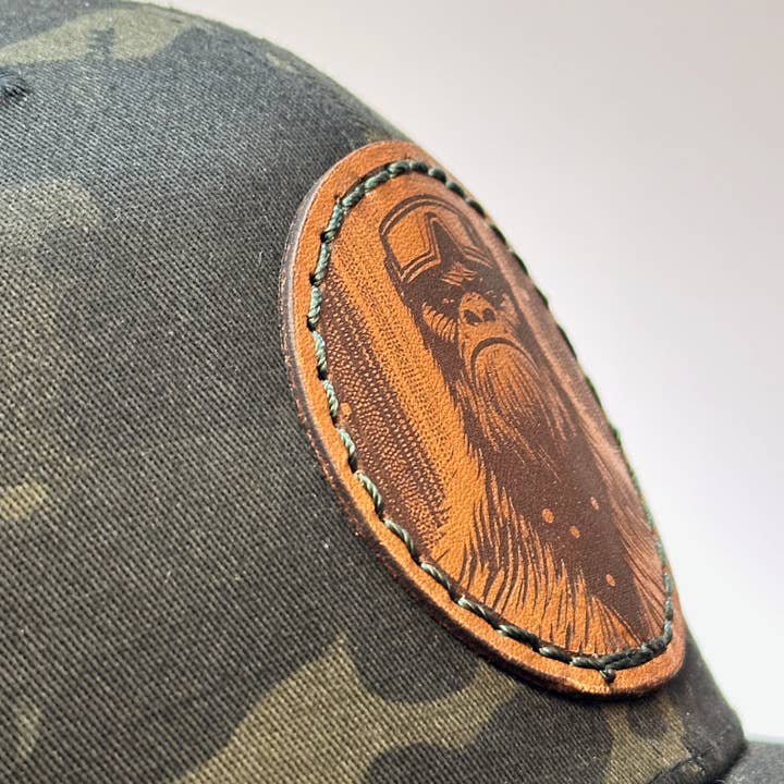 Last Best Supply Co – wholesale Trucker hat – Unisex – Bigfoot Face Thick Stitch Leather Trucker Hat