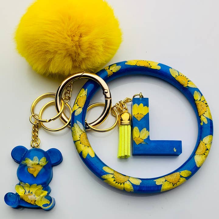 Conjunto de pulseira de chaveiro de girassol azul/amarelo por atacado de Shop Drip Express
