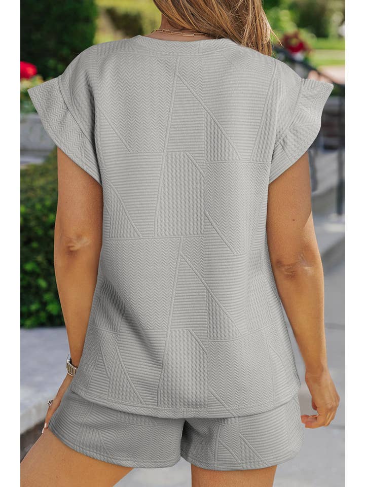 Aapparella - Vente Ensemble de vêtements d'intérieur – femme - Ensemble t-shirt et short à volants texturés unis pour femmes | S-2XL1