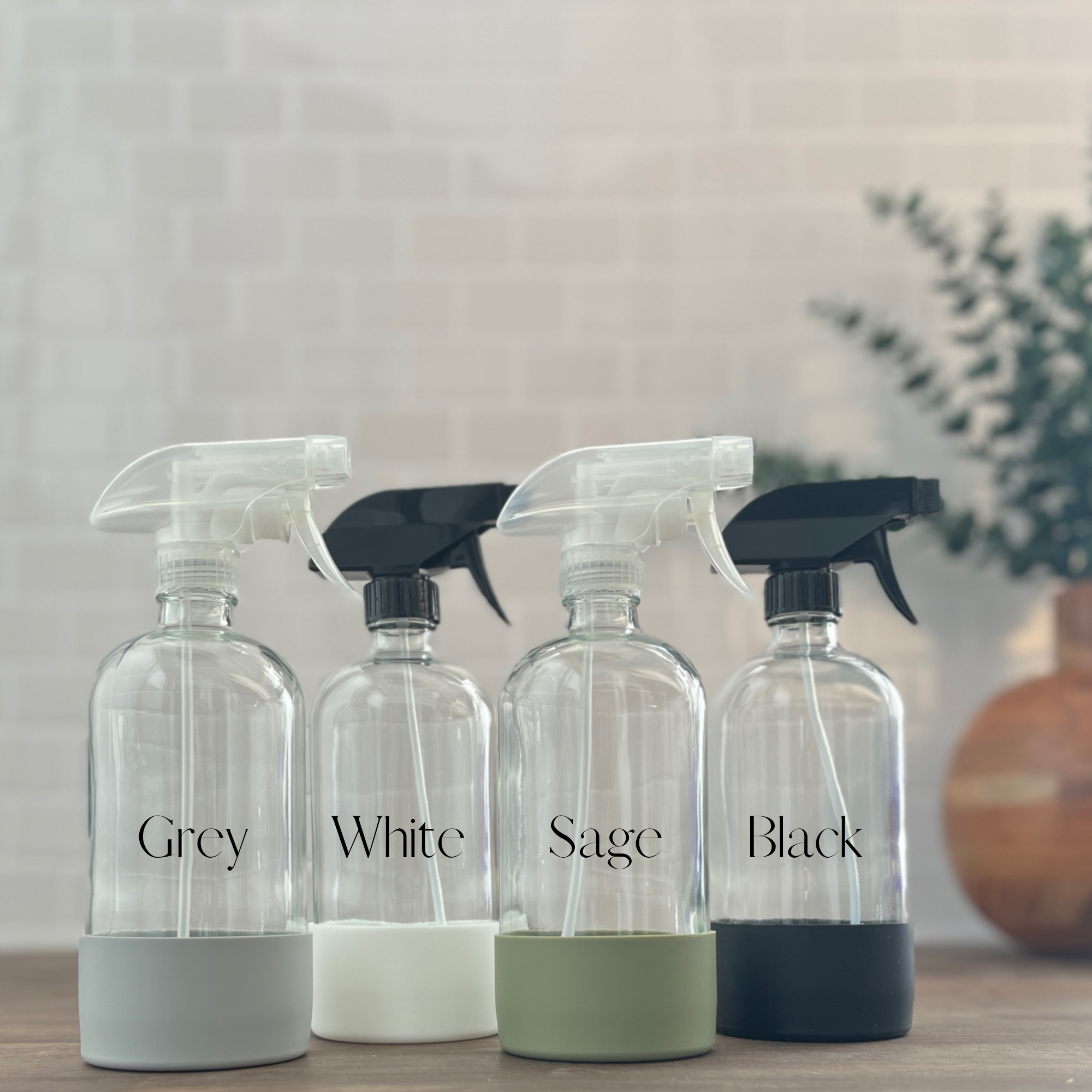 The Bottle Shoppe - Wholesale Spray Bottle - 16oz Clear Bottle with Silicone Sleeve | Pump, Cap, Sprayer1