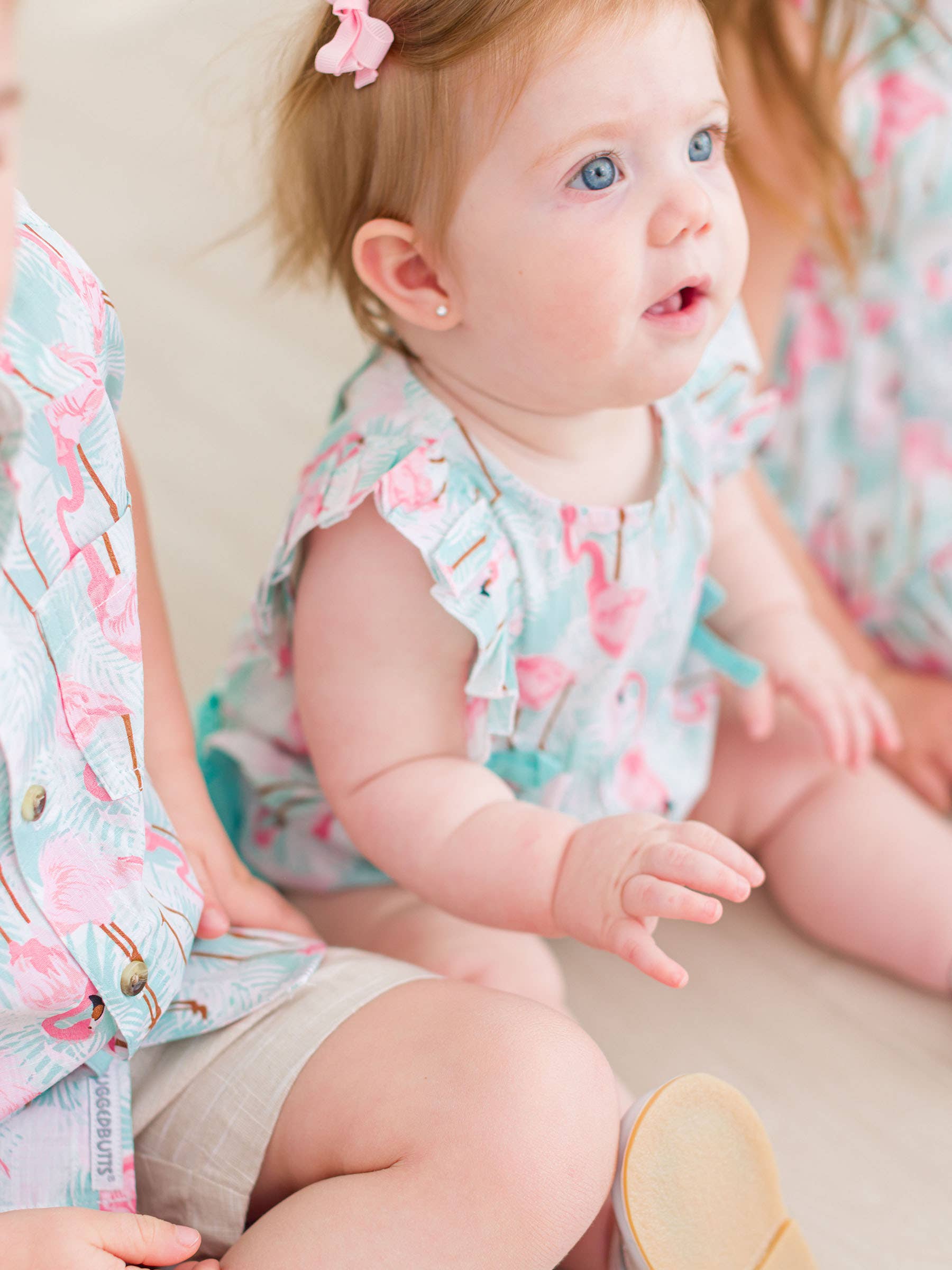 Multi Color Baby Girls Vibrant Flamingo Classic Ruffle Bubble Romper for wholesale on Faire4