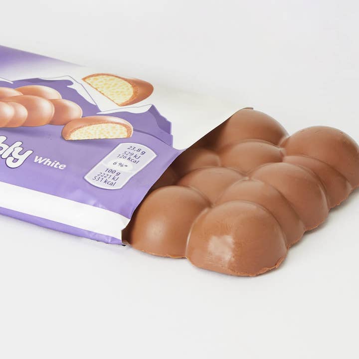 Phoenix Distributions - Vendita all'ingrosso Barretta di cioccolato - MILKA - Bubbly White 95 grammi 15 pezzi1