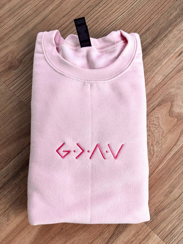 God Is Greater Than the Highs and Lows Sweatshirt | Pink for wholesale by D&E Threads