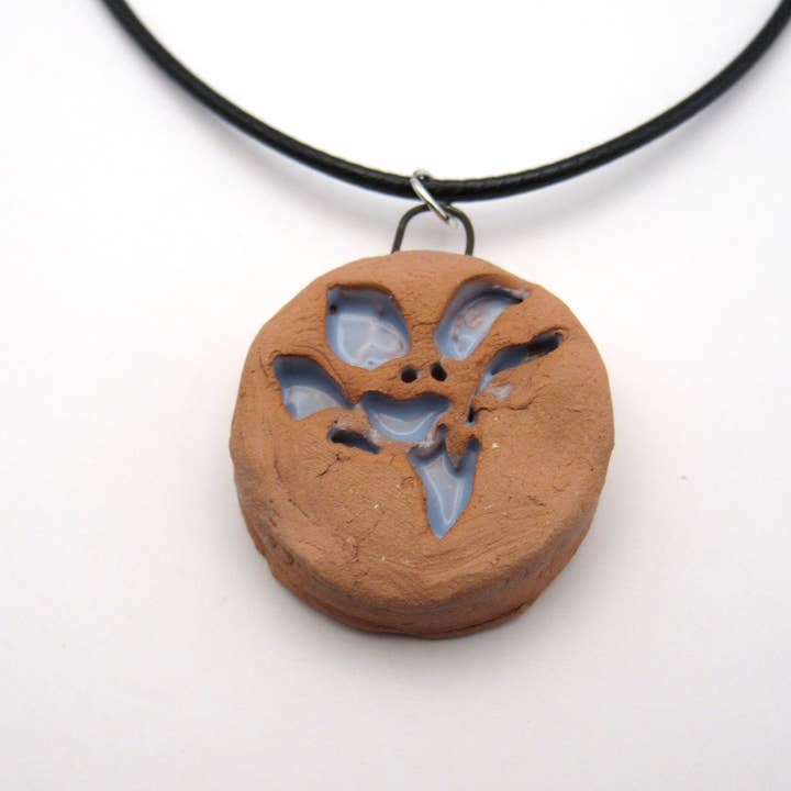 Abstract Flower Terracotta Round Pendant Necklace for wholesale by A Mayes Pottery