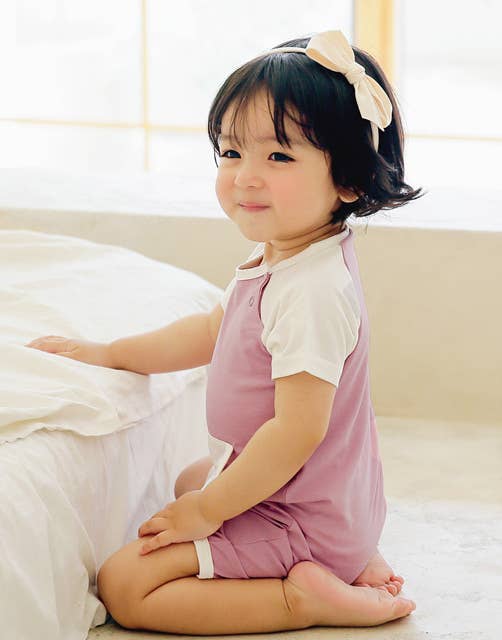 Bamboo Smile Purple Baby Romper for wholesale on Faire2