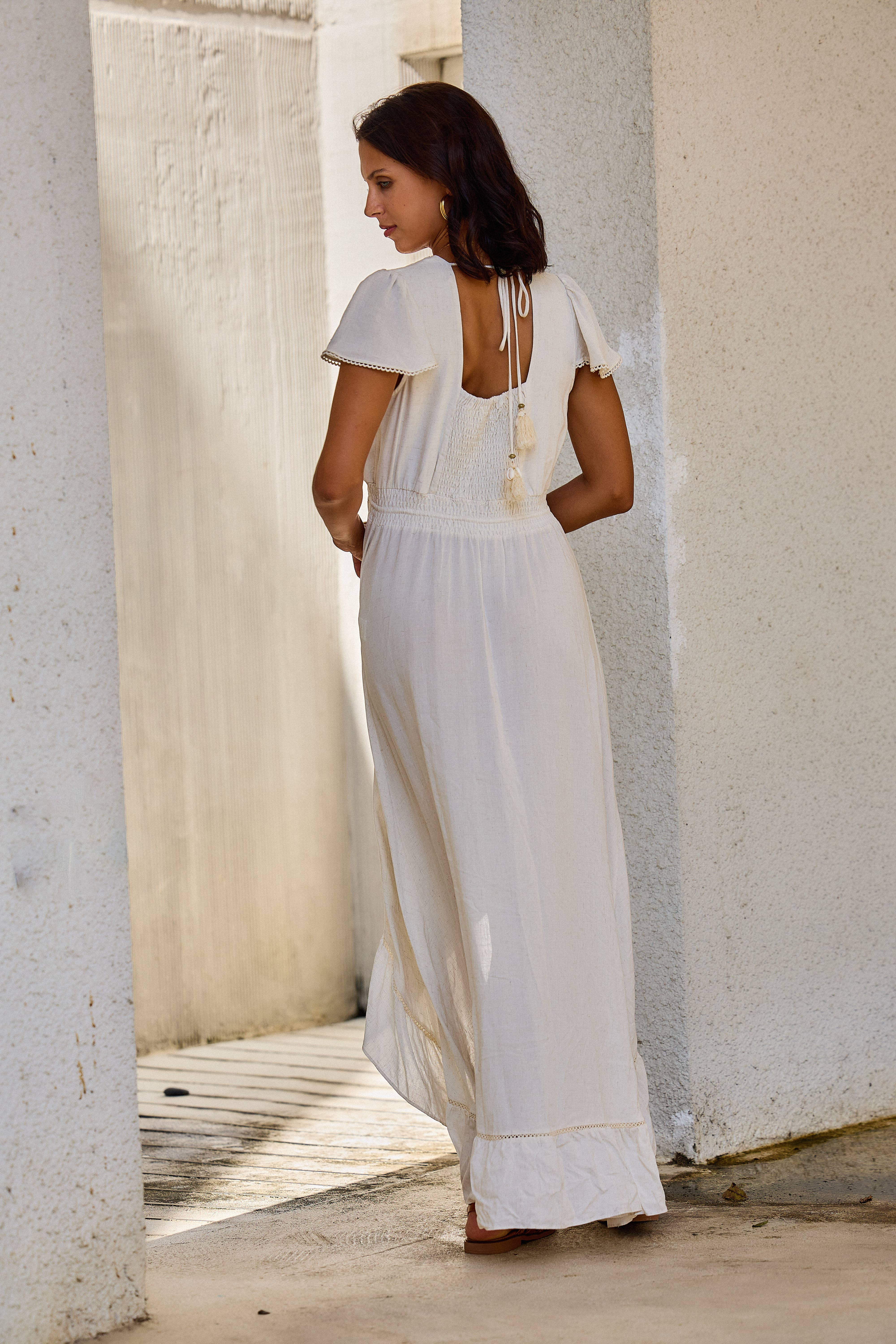 White Asymmetrical long dress with floral embroidery, v-neck for wholesale on Faire2