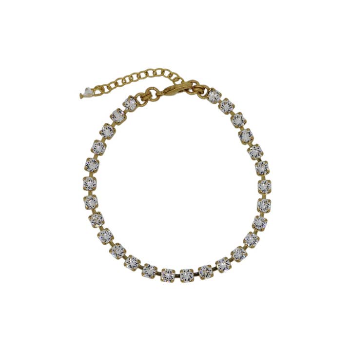 Le bracelet tennis clair en or pour la vente par VICKISARGE