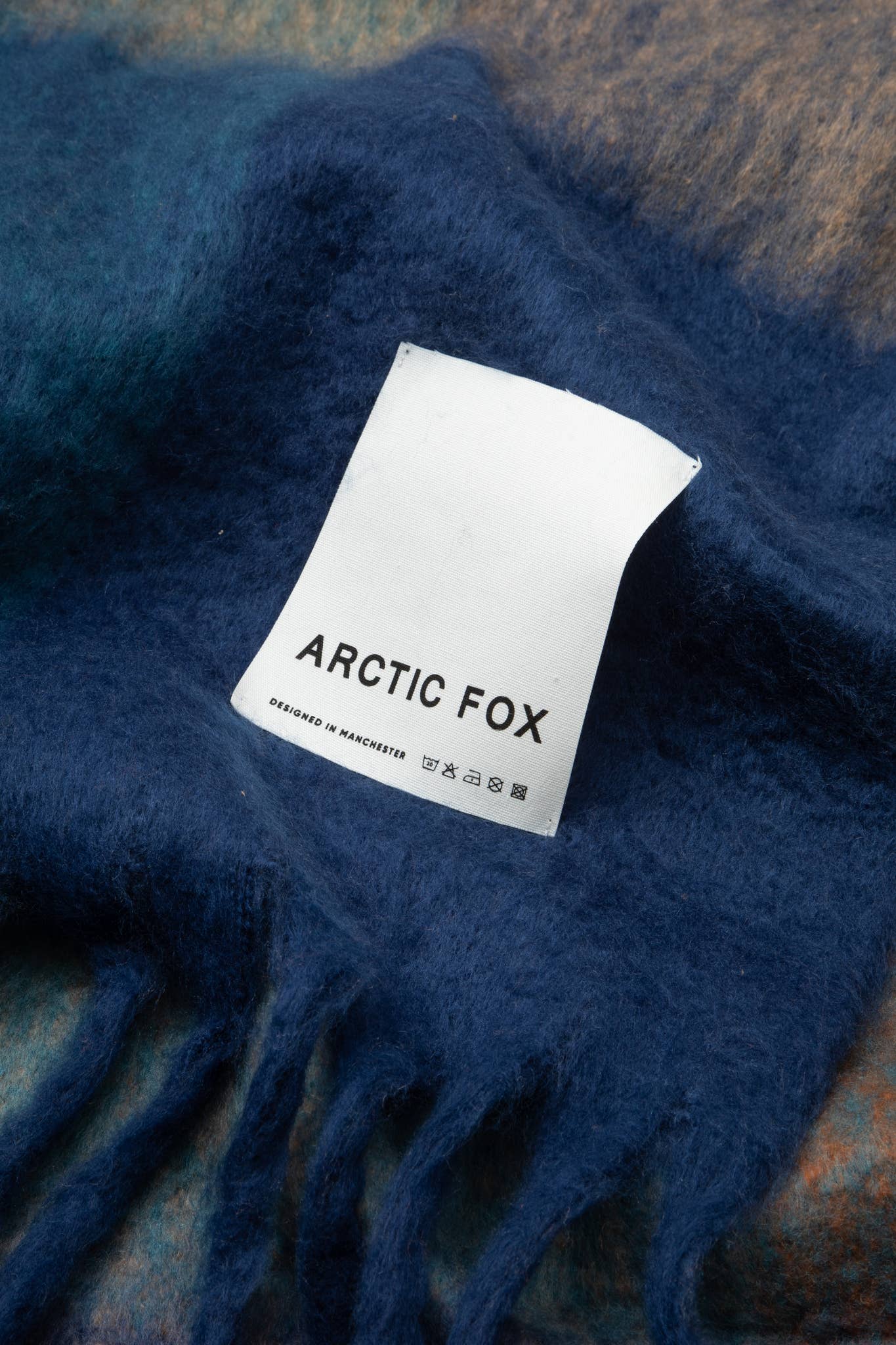 Arctic Fox & Co. - North America - Vente Plaids - Le Reykjavik Throw - 100 % recyclé - Lumières de Tokyo - FW257