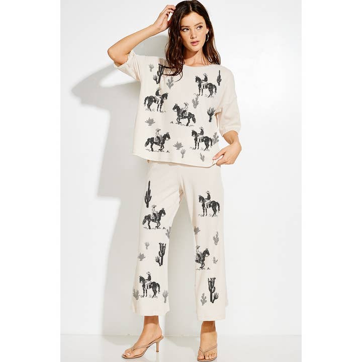 Ensemble haut et pantalon thermiques à imprimé cowboy West Vibes pour la vente par Phil Love