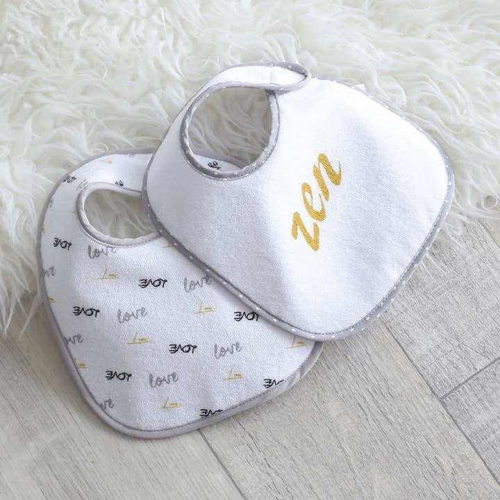 Set di 7 bavaglini - Baby cool per la vendita all'ingrosso da parte di Trois kilos Sept