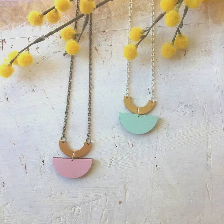 Arc Contemporary Wooden and Brass Necklace for wholesale by Red Paper House