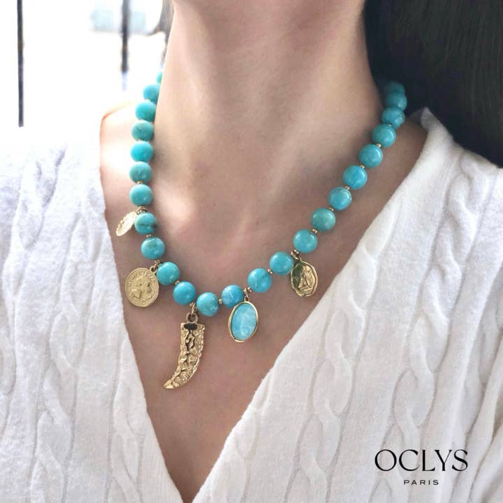 Colored resin bead necklace with stainless steel charms for wholesale by Oclys