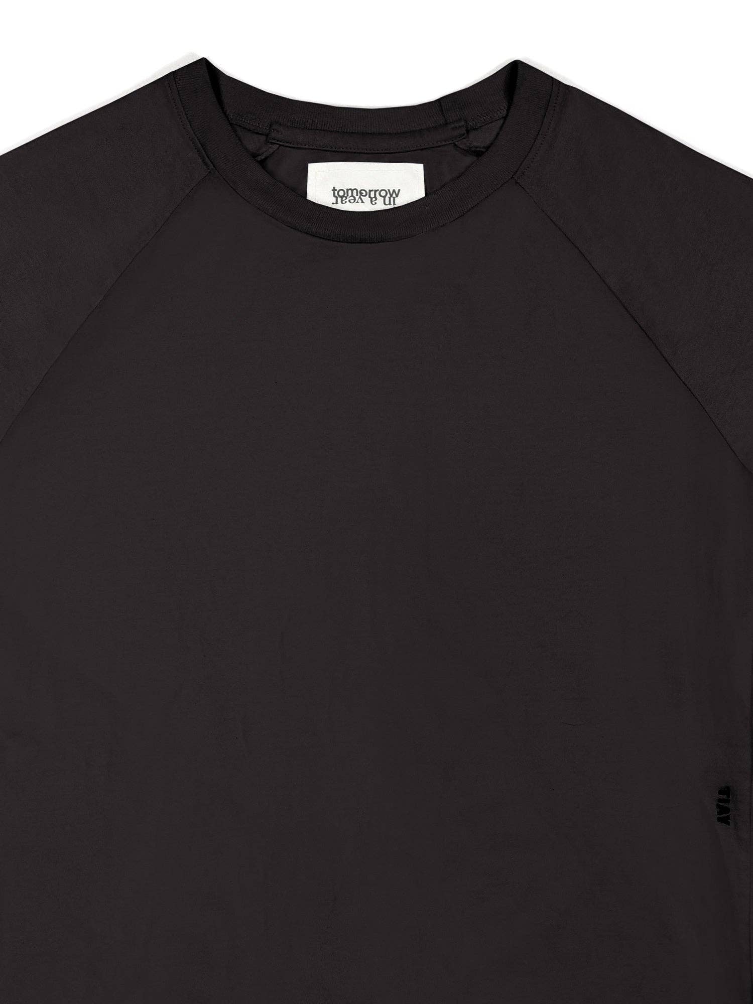 Negro Camiseta ajustada de manga raglán monocromática - Negro de venta al por mayor en Faire7