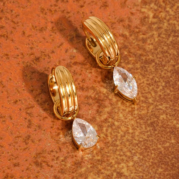 Saffron 18K Gold Non-Tarnish Teardrop CZ Mismatch Earrings for wholesale on Faire1