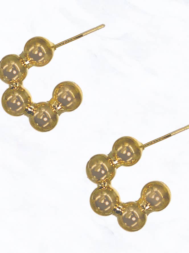 Orecchini a perno aperti con perline in tinta unita per la vendita all'ingrosso da parte di Suzie Q USA