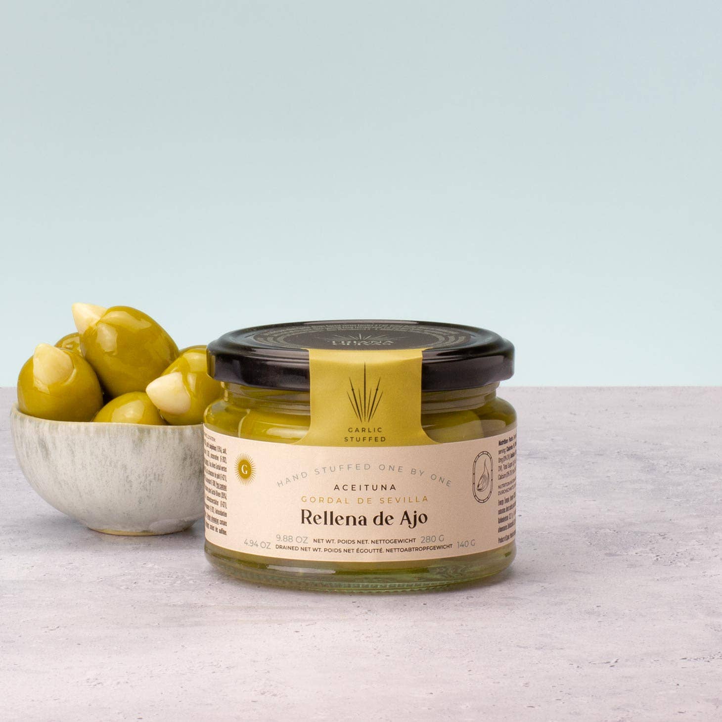 The French Farm - Wholesale Olives - Triana Olivas Garlic stuffed Gordal Olives 9.88oz4