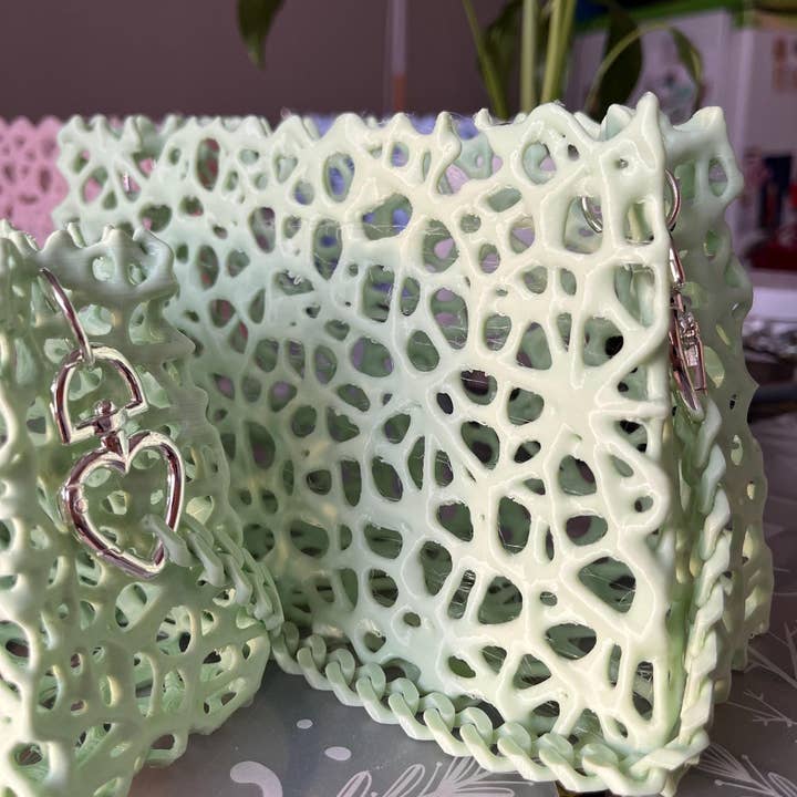 Sustainable Green Clutch with Elegant Silver Details for wholesale by <3 Studio