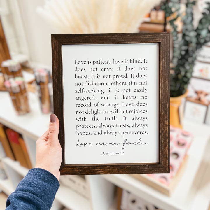 Knotty Design Co. - Wholesale Sign - Love Never Fails Framed Wood Sign
