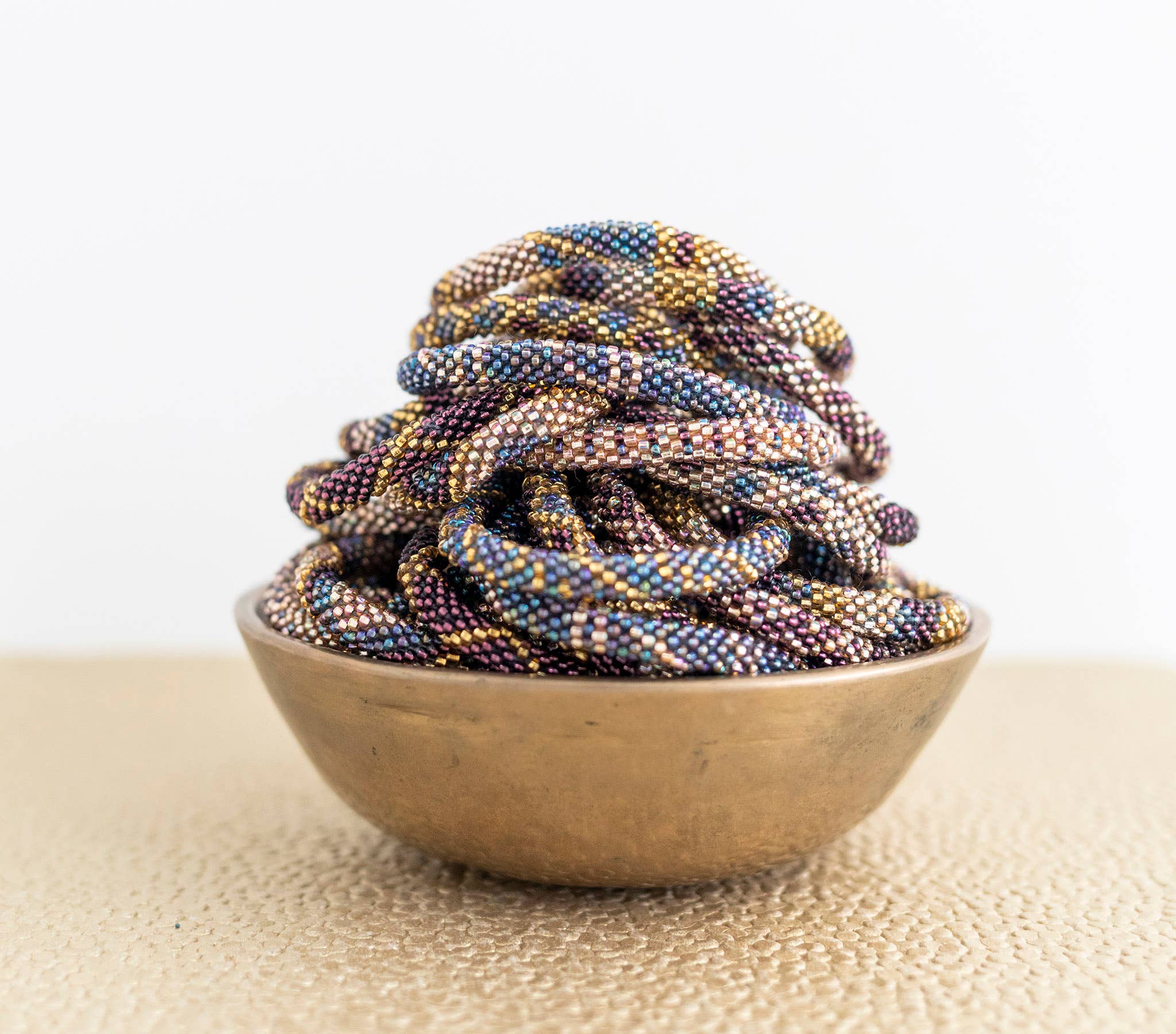 Aid Through Trade – Großhandel Perlenarmband – Roll-On® Armbänder - Bejeweled Set mit 12 Stück1