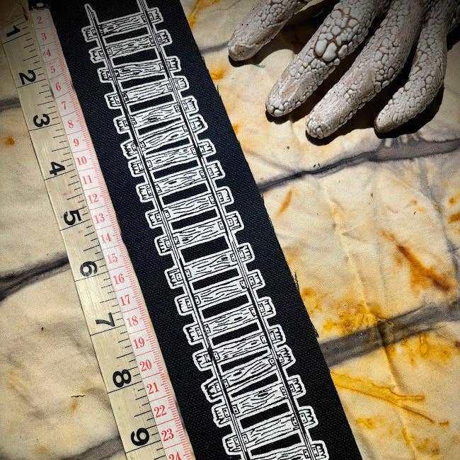 Three Raccoons - Wholesale Patch - Train tracks patch. 11 inches long.0