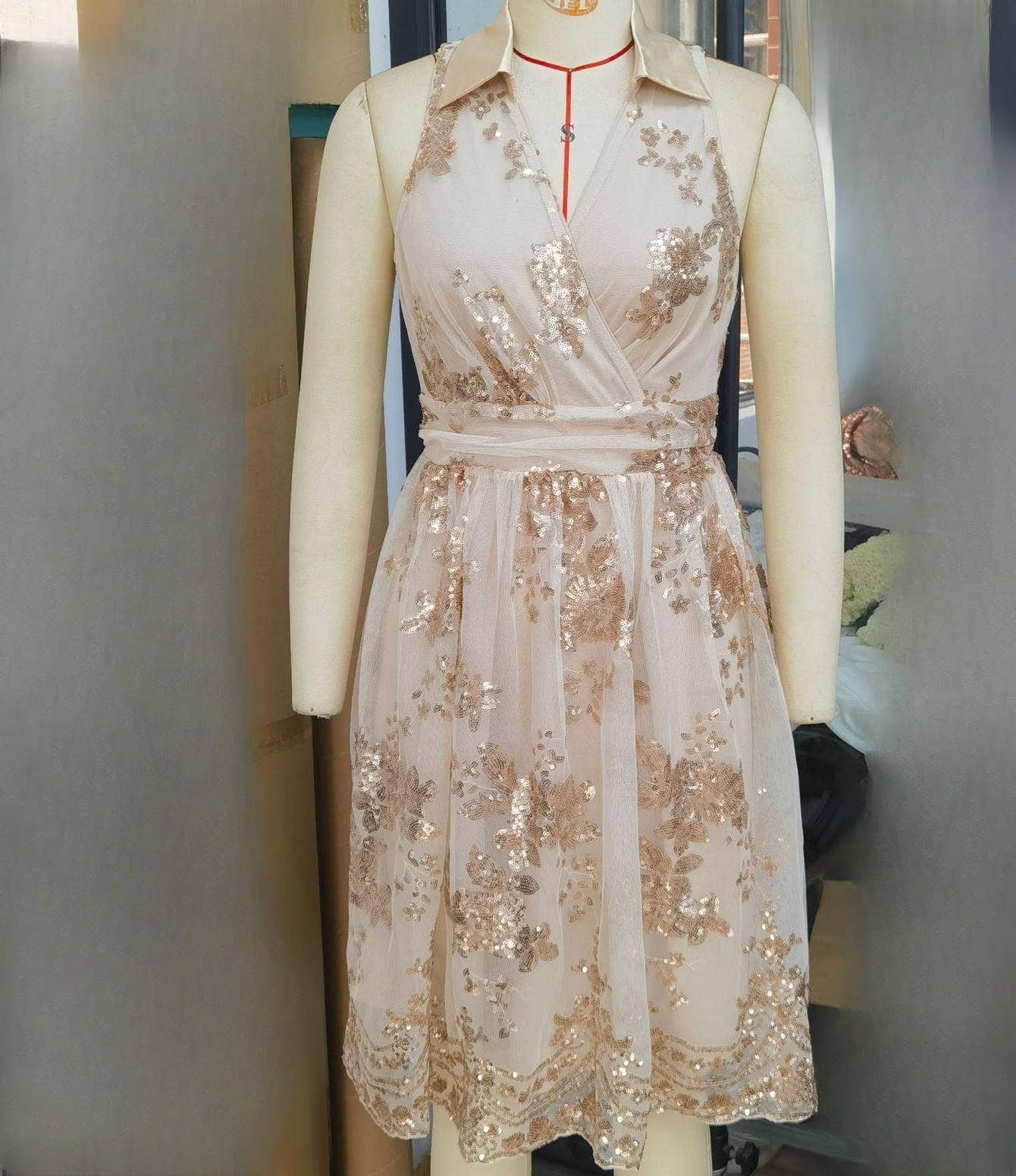 Champagn V-neck sleeveless swing sequin dress for wholesale on Faire0