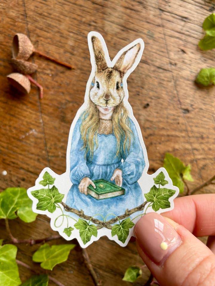 Girl in Rabbit Mask Matt Vinyl Sticker | Curious Art for wholesale by Georgiou Draws