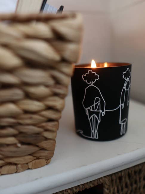 Hand poured, hand viynled Soy wax candle for wholesale by Minus Cloud Nine