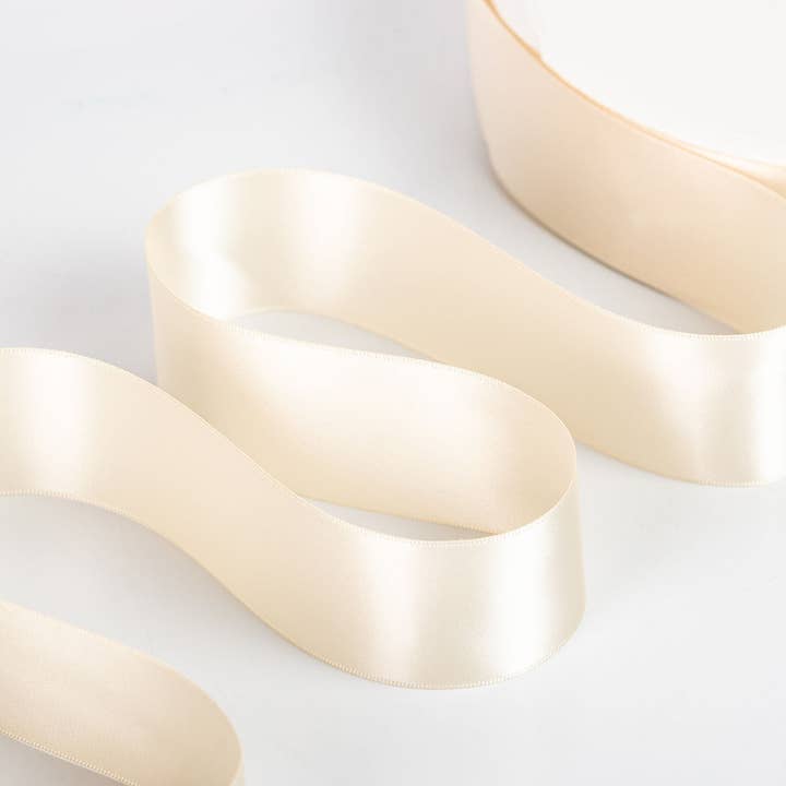Ecru 128 Double Faced Satin Ribbon 100-Yard Roll for wholesale by Little Ribbon Shop