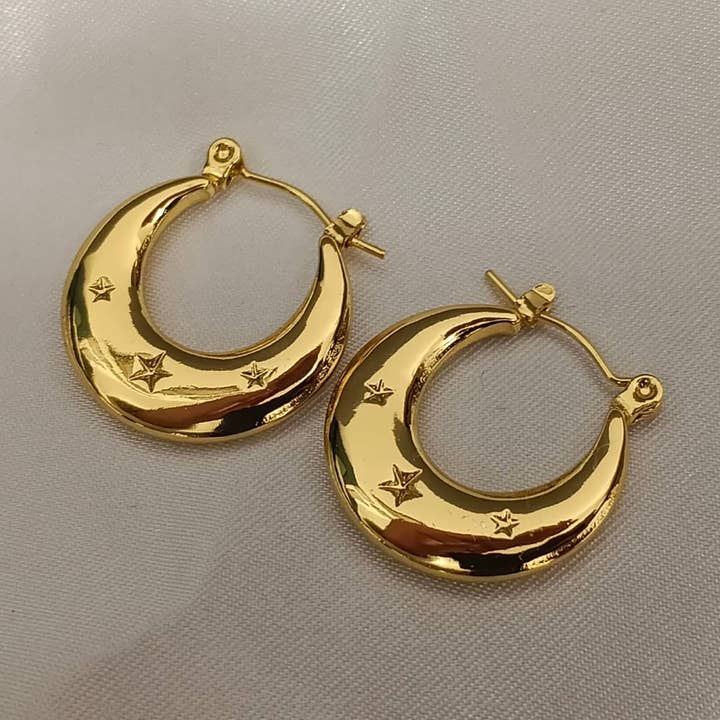 Polar star hoop earrings in 18K gold-plated steel for wholesale by Minimalistajoyeria