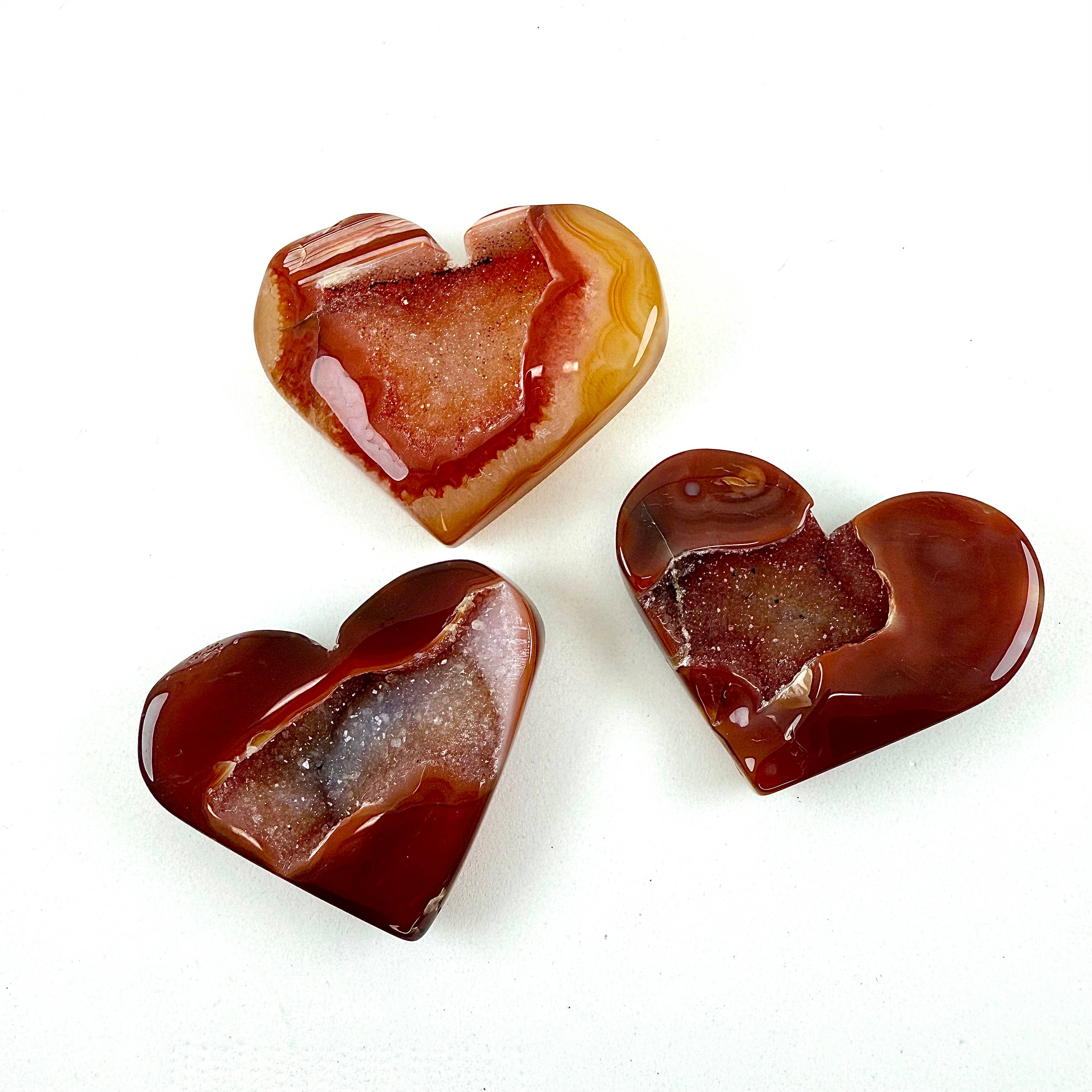 Liv Rocks – Großhandel Spiritueller Stein/Kristall – Karneol-Druzy-Herzen + Handsteine0