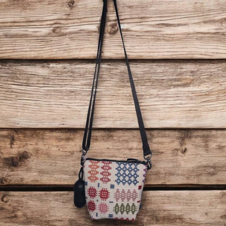 Cream Welsh tapestry blanket design mini cross body bags for wholesale on Faire