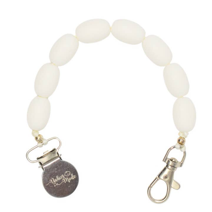 Attache-tétine en silicone blanc pour bébés pour la vente par Babies a la Mode