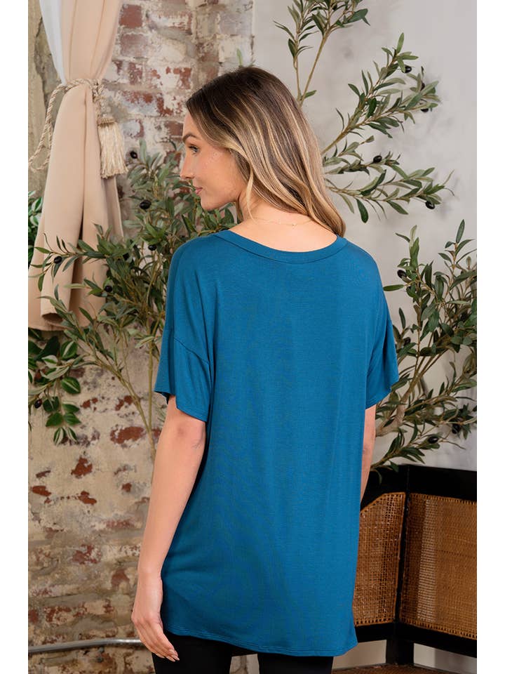 Teal Oversized V-neck Graphic Short Sleeve Top for wholesale on Faire
