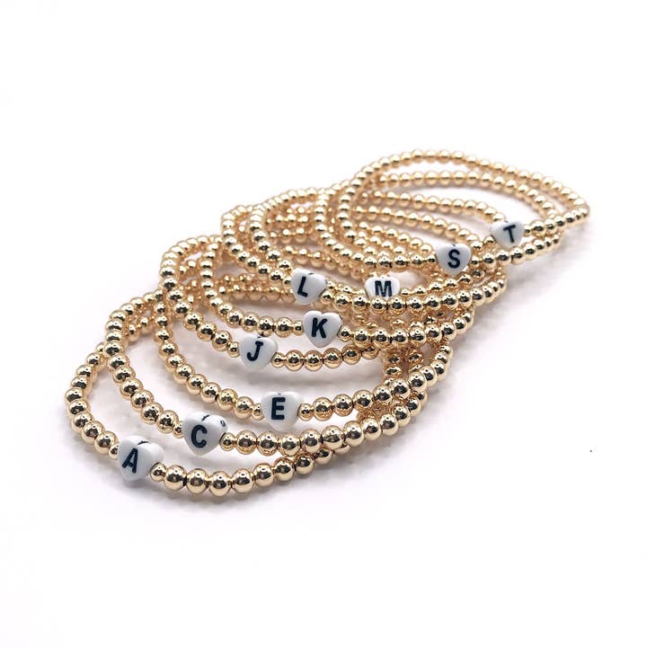 Set of 10: Custom Handmade Initial Stretchy Gold Bracelet for wholesale by Kaylie Dawn Jewelry