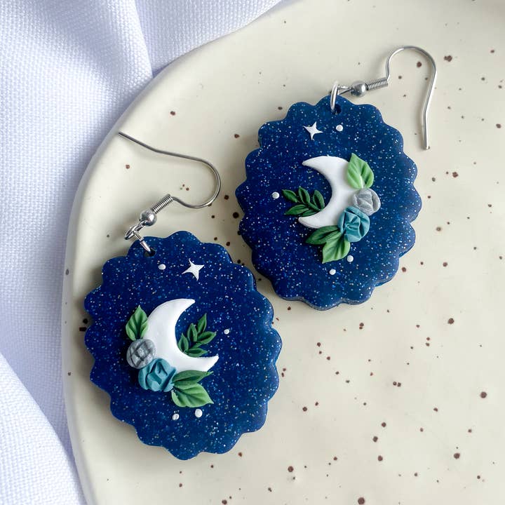 Blue Floral Moons / Clay Nature Stars Celestial Earrings for wholesale by Peripheral US
