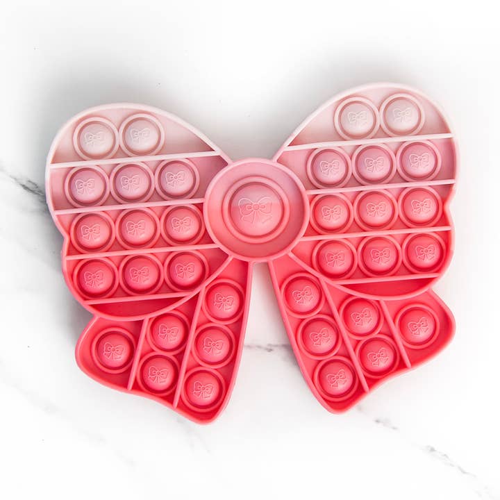Pink Bow Pop It for wholesale by Golden Thread