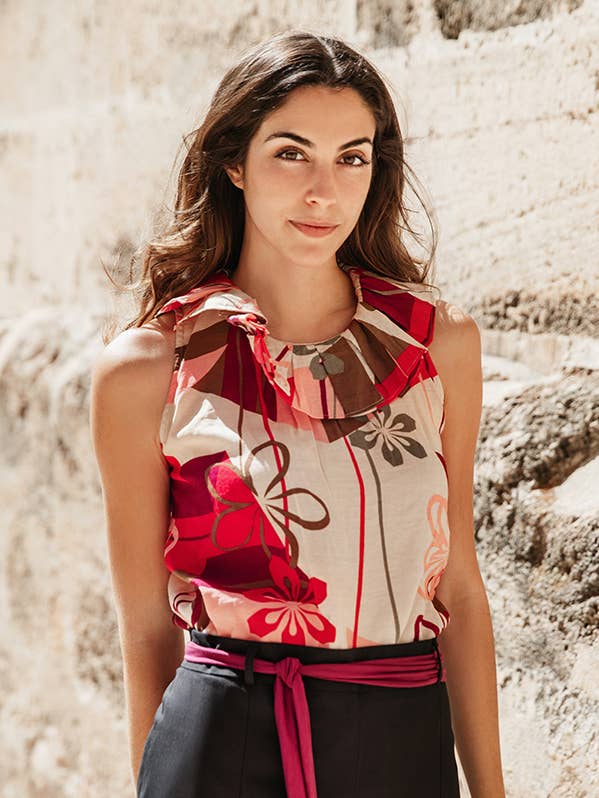 Top senza maniche con svolazzo al collo per la vendita all'ingrosso da parte di Euterpe Clothing