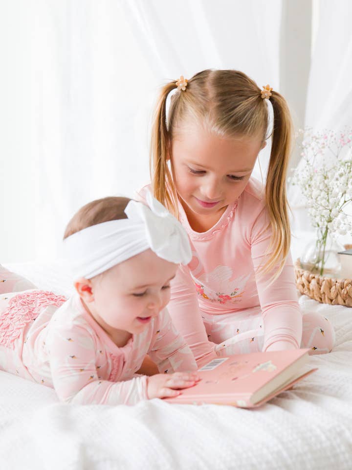 Pink Toddler Girls Swan Lake Dream Bamboo Viscose Ruffle Long Sleeve Pajama Set
for wholesale on Faire