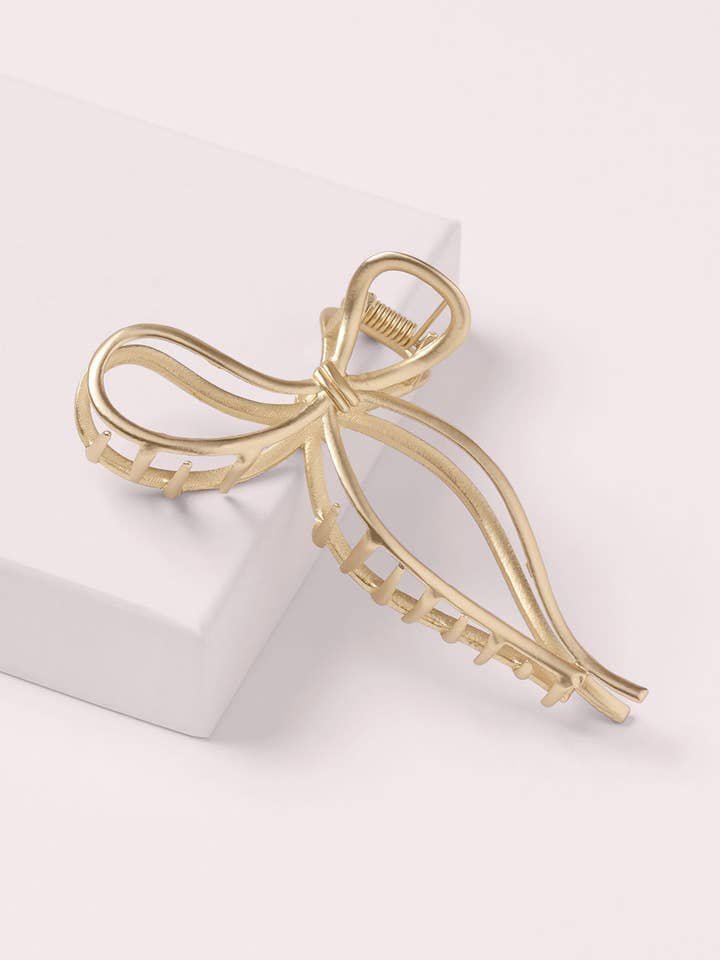 Förgylld bågkloklämma för wholesale av The Hair Edit