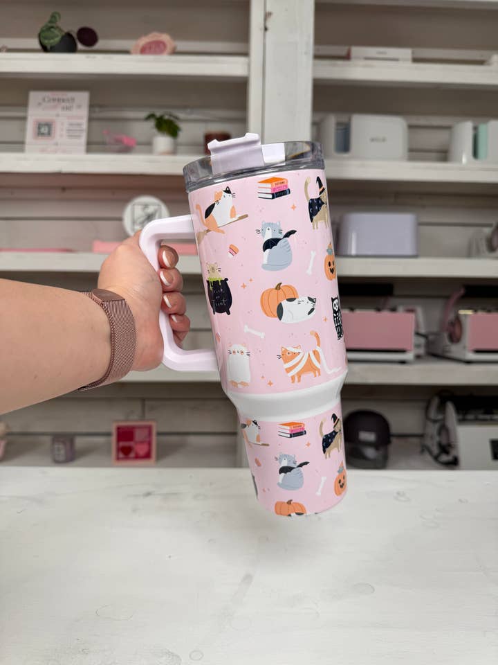 Halloween Bookish Cats 40oz tumbler, Spooky Book Vibes quencher, Halloween Books and Cats custom tumbler for wholesale by Selena Marie LLC